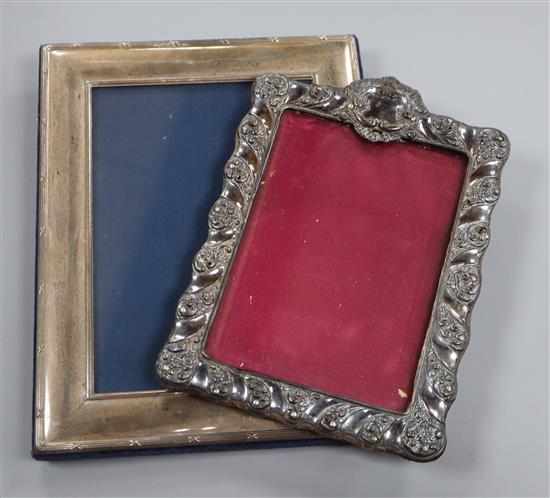 A late Victorian repousse silver mounted photograph frame, Birmingham, 1900 and a modern silver mounted photograph frame,